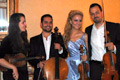 Reunited for a brief performance with the family string quartet and my siblings from left, Sasha, Dimitri, and Nico